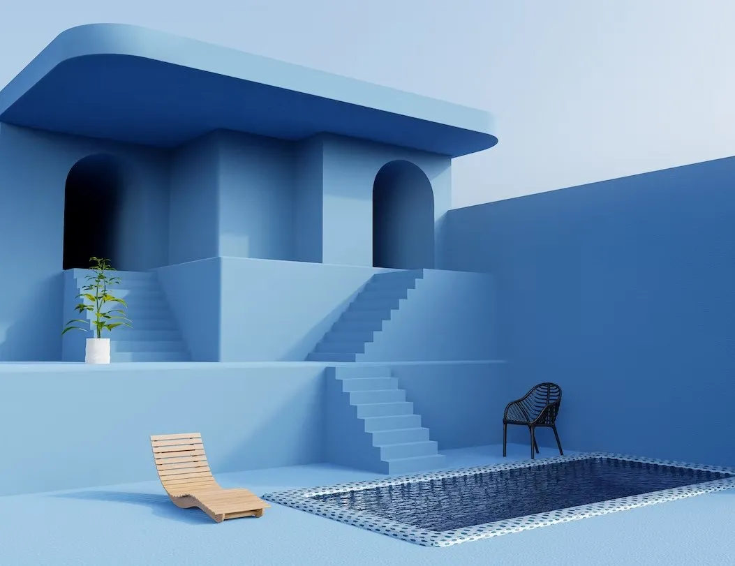 Blue concrete courtyard with stairs and a pool